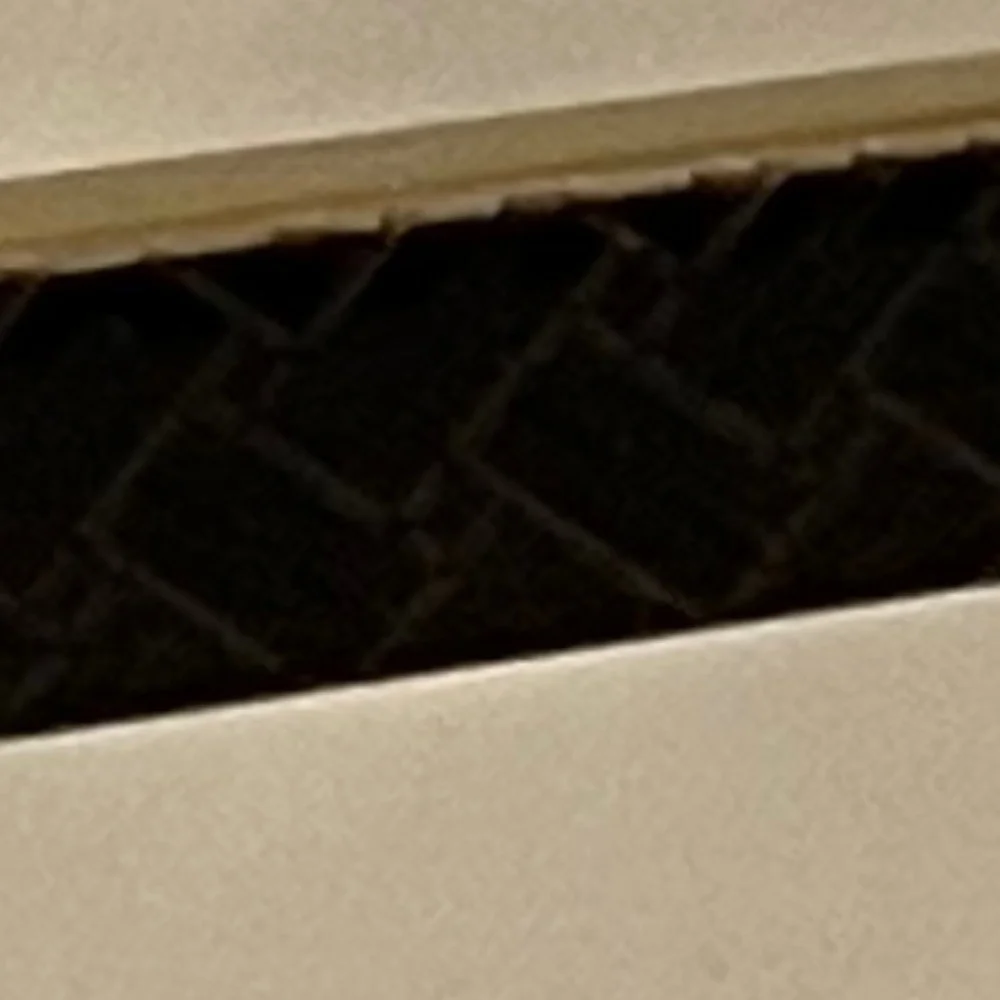 Cole Haan Brown Horn with Basketweave Detail Frame